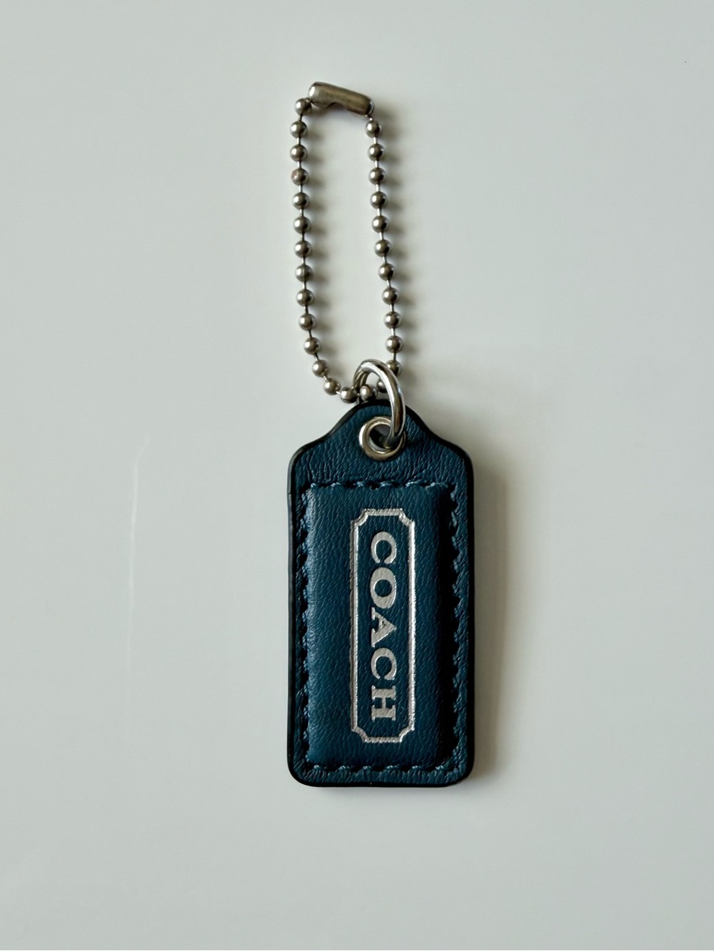 Coach Dark Teal / Midnight
Viridian Leather Handbag Hangtag